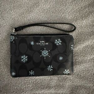 Coach Black Wristlet with Light Blue Snowflake Motif